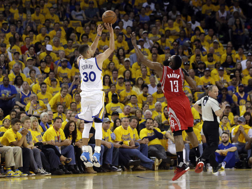 Stephen Curry shooting over James Harden